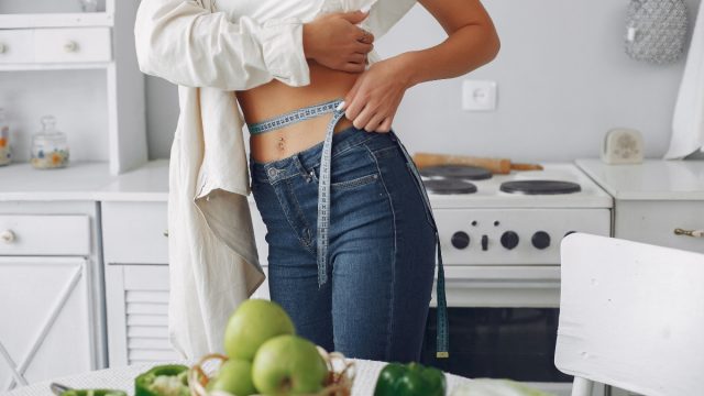 beautiful-sporty-woman-kitchen-with-vegetables-1